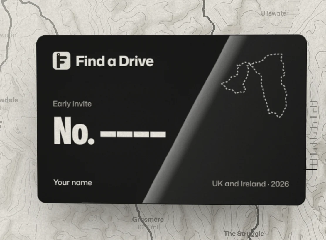 Find a Drive's early-invite card, black, with a streak of light across its clear coat